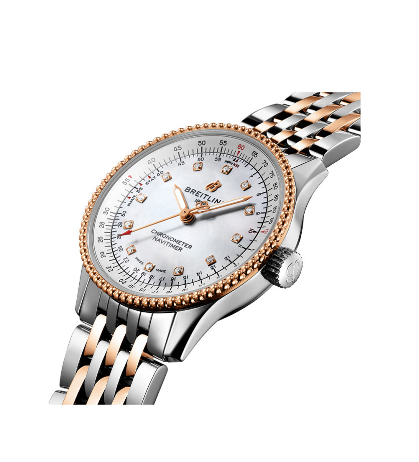 Montre Breitling Navitimer Automatic cadran nacre blanche index diamants bracelet acier et or rouge 18 carats 35 mm