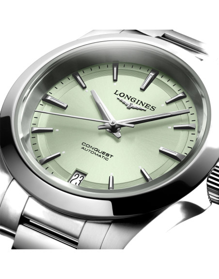 Montre Longines Conquest automatique cadran vert bracelet acier 34 mm